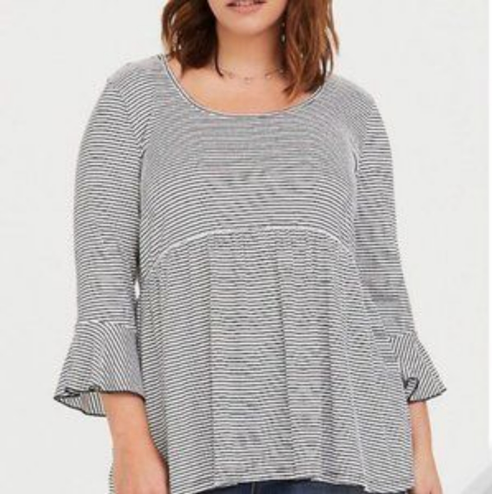 Torrid striped black and white tunic peplum style size 3. Mild piling under arms